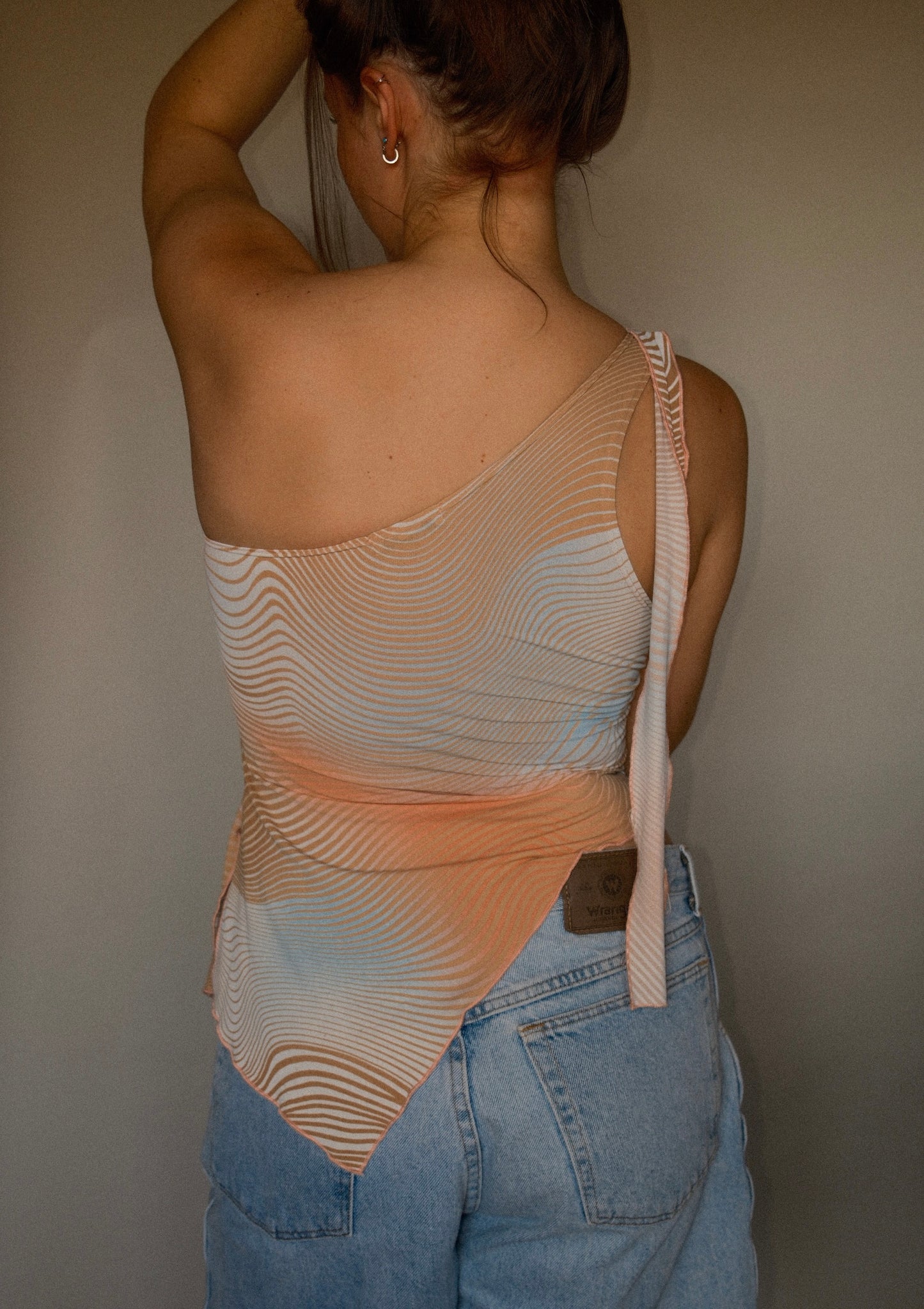 Asymmetrical top